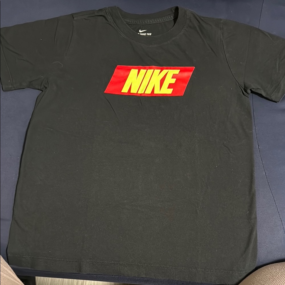 Nike Black Tee with Vibrant Red and Yellow Logo